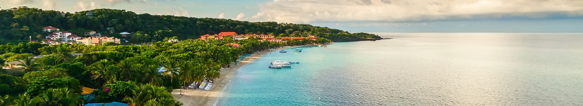 Flight+Hotel deals to **Roatan**