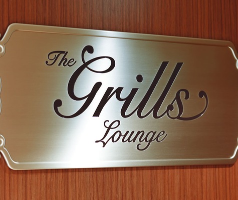 QV Grills Lounge Sign