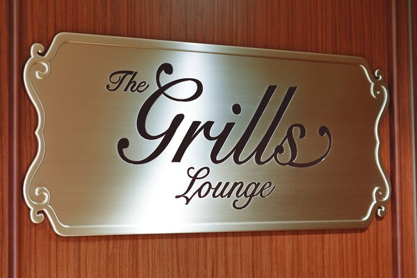 QV Grills Lounge Sign