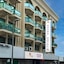 Click Grand Hotel Llc